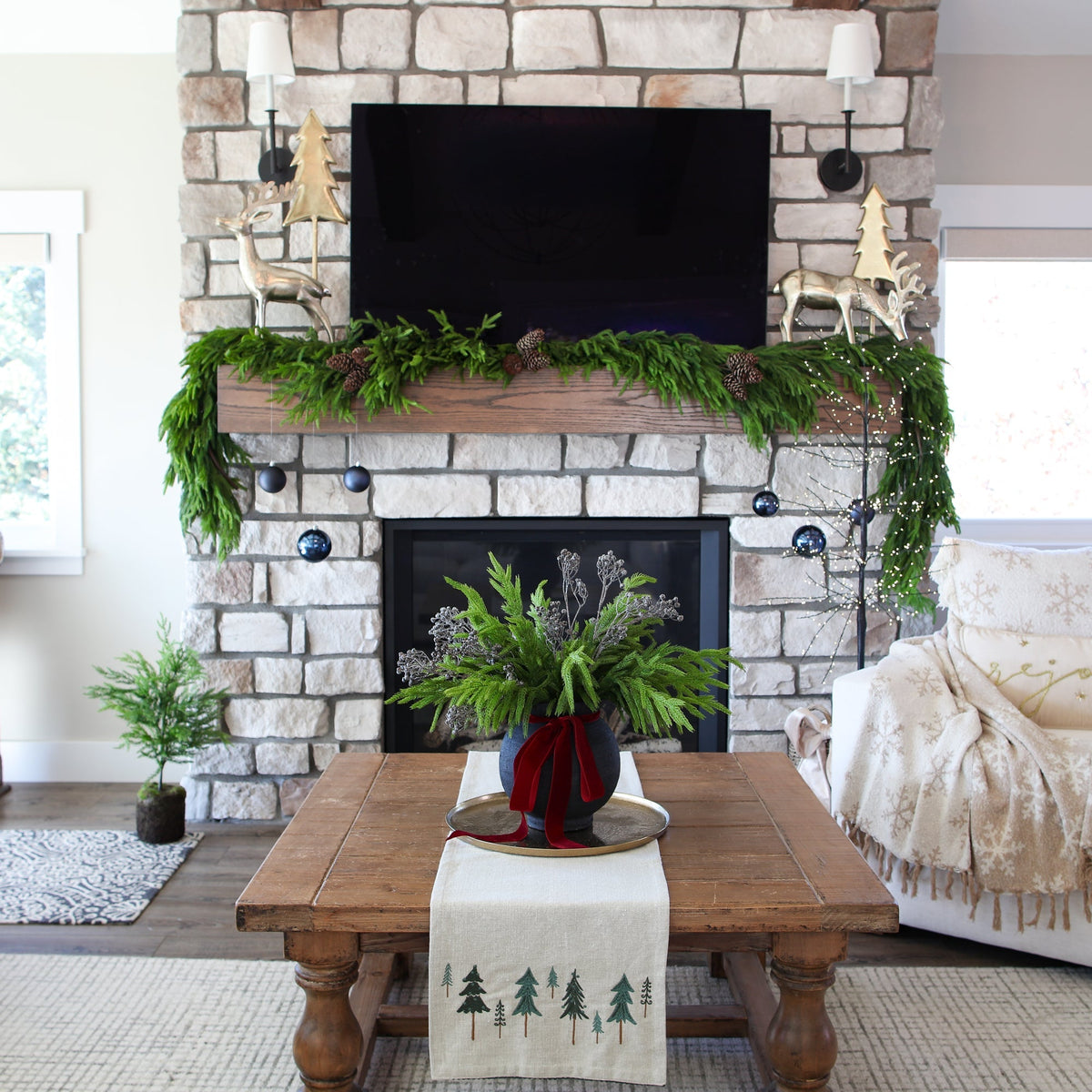 SOLD OUT ARRANGEMENT: Wintery Norfolk & Glitter Pods in Black Vase - Interior Delights