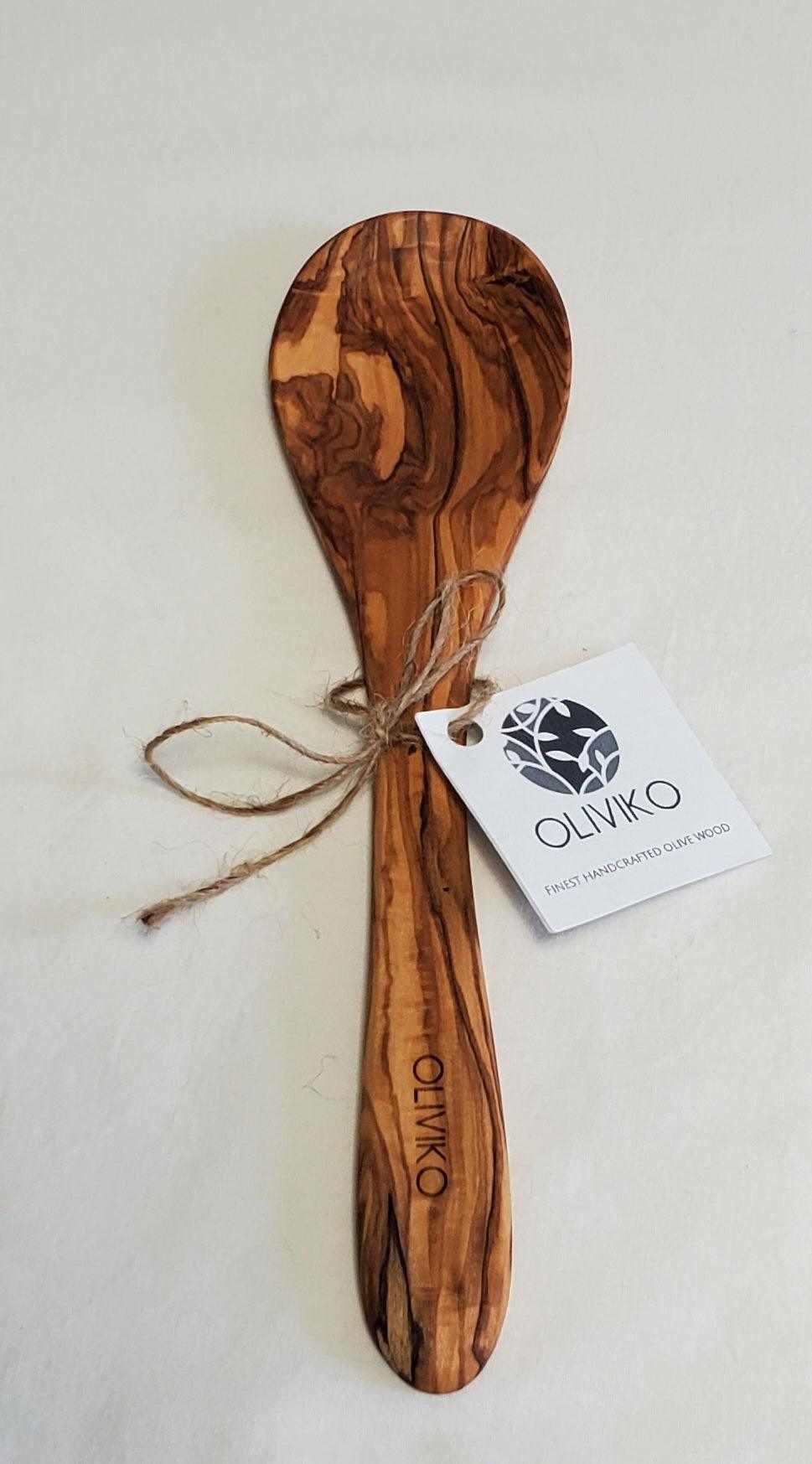 Handmade 9.5-inch olive wood spoon with natural grain and OLIVIKO tag