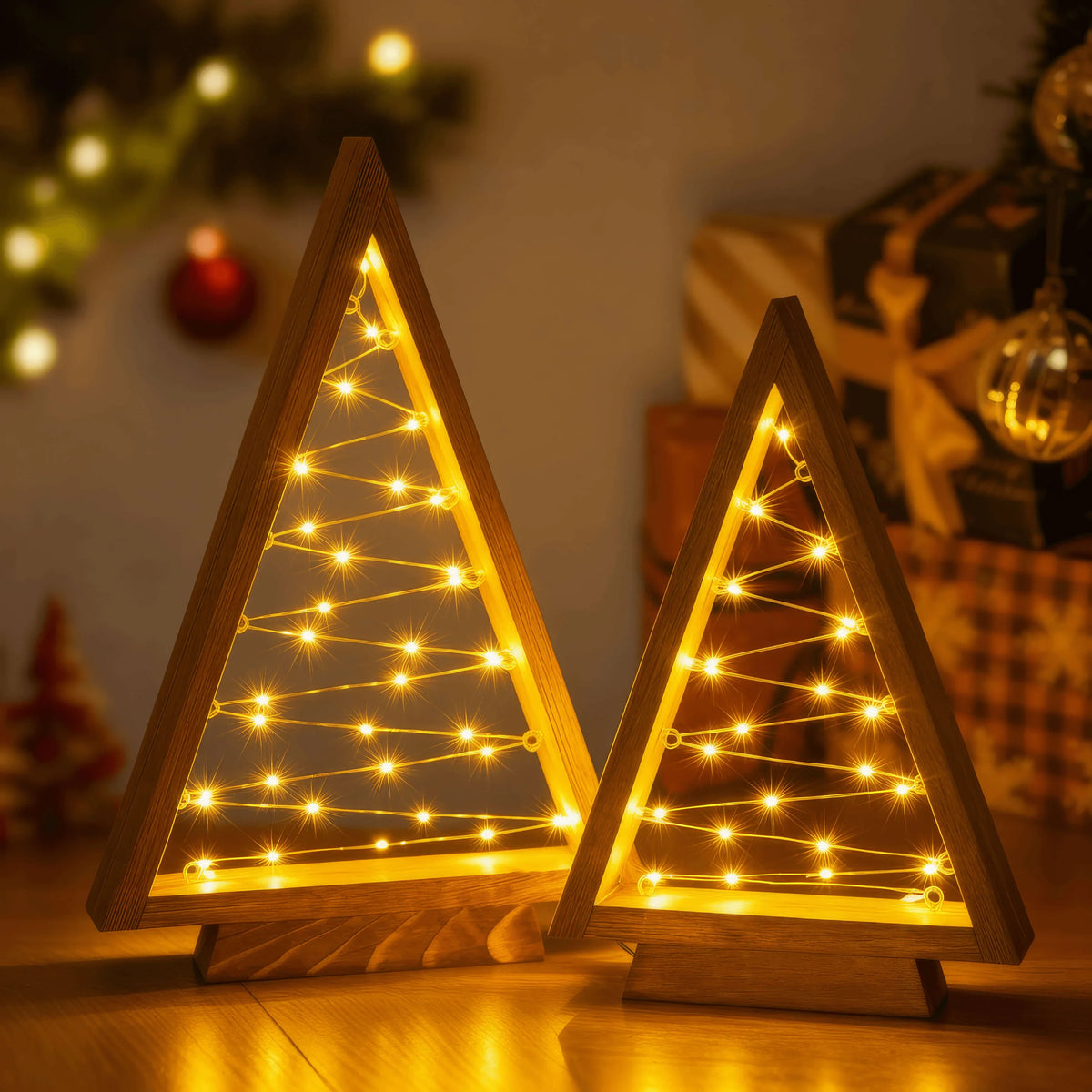 Timber Triangle Trees Set of Two in a Wooden Finish with Golden Fairy Lights at 14 and 10 Inches Tall