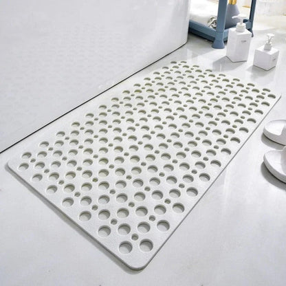 Suction Cup Shower Mat with a Textured Surface and Water Drainage in Seven Colors