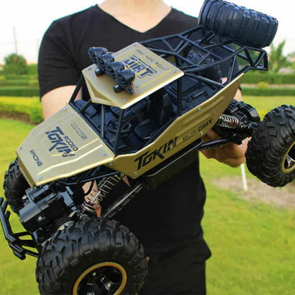 Rechargeable 1:12 Scale 4WD Remote Control Monster Truck with Two Battery Packs and a 2.4GHz Controller