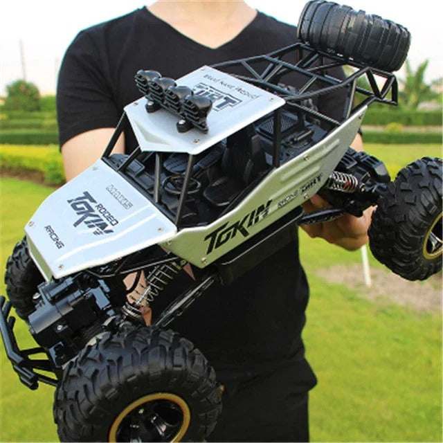 Rechargeable 1:12 Scale 4WD Remote Control Monster Truck with Two Battery Packs and a 2.4GHz Controller