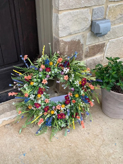 Silk Buttercup Wreath with Eucalyptus Foliage and Grapevine Base, 19-22 Inches