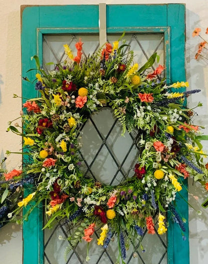 Silk Buttercup Wreath with Eucalyptus Foliage and Grapevine Base, 19-22 Inches