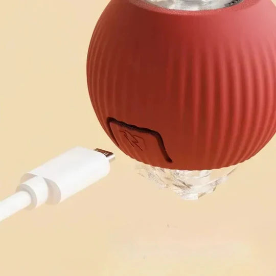 Rolling Ball Toy with Motion Activation and Soft Tail for Dogs