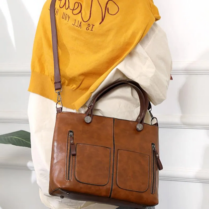 Genuine Leather Bag with Multiple Interior Compartments and Structured Design