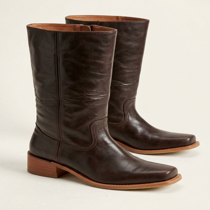 Trendy women's mid-calf boots with a block heel, offering both elegance and walking comfort.