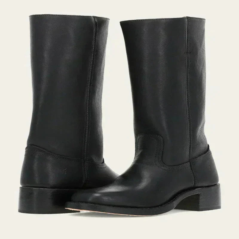 Fashionable women's mid-calf boots, featuring a sturdy block heel for comfort & style.