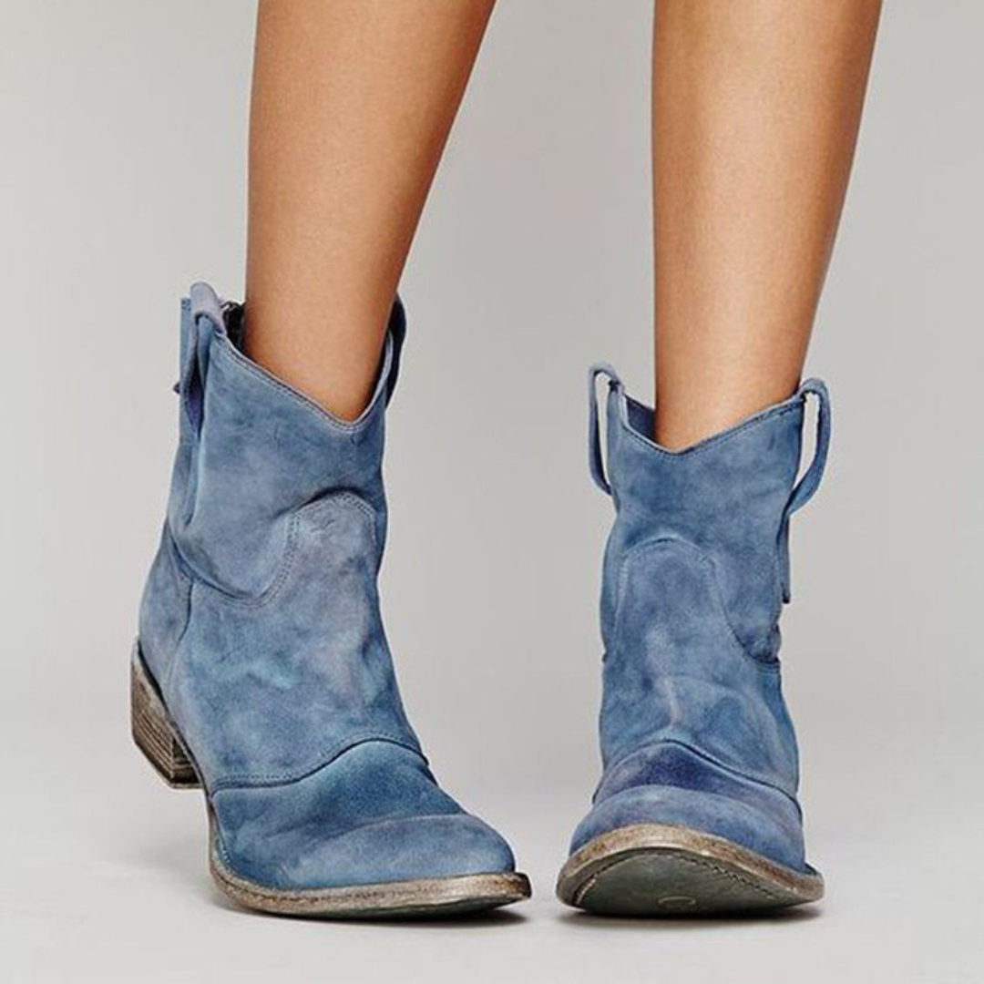 Elegant women's Western ankle boots, featuring classic design and practical pull tabs.